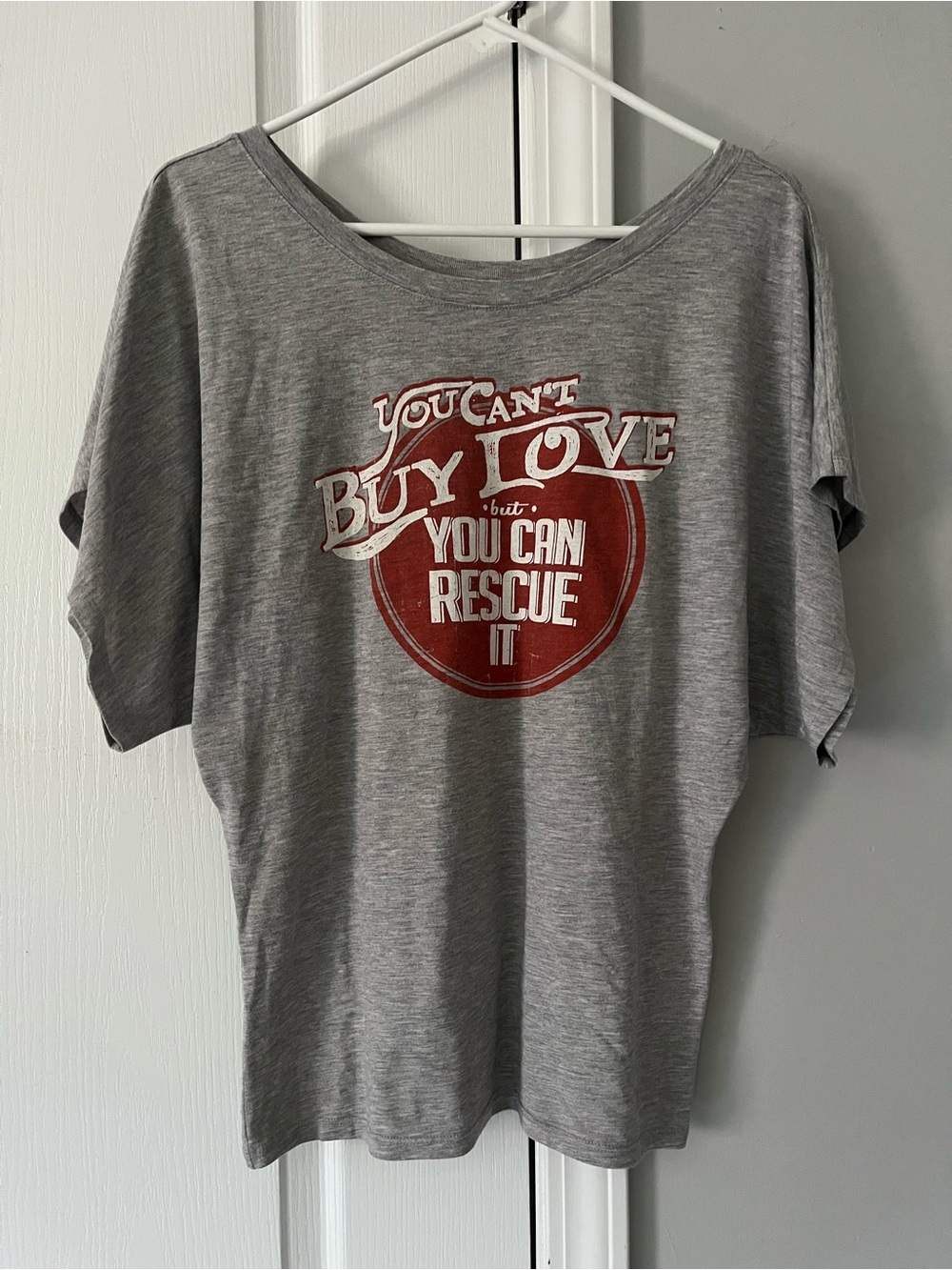 “You Can’t Buy Love, But You can Rescue It” Dolman Tee Top